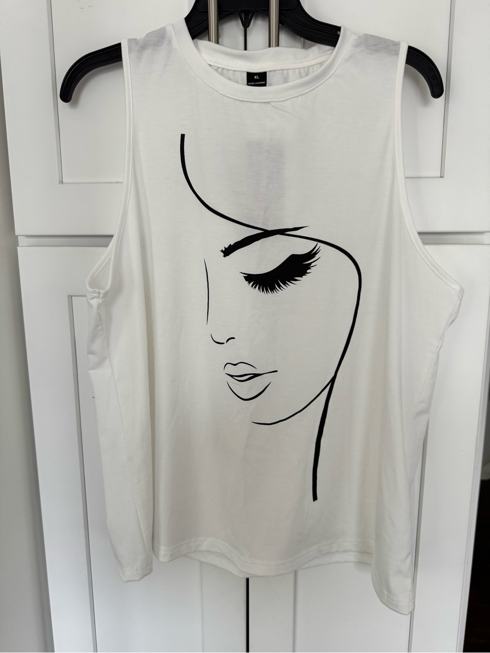 Women's White Graphic Sleeveless Top with Minimal Face Print